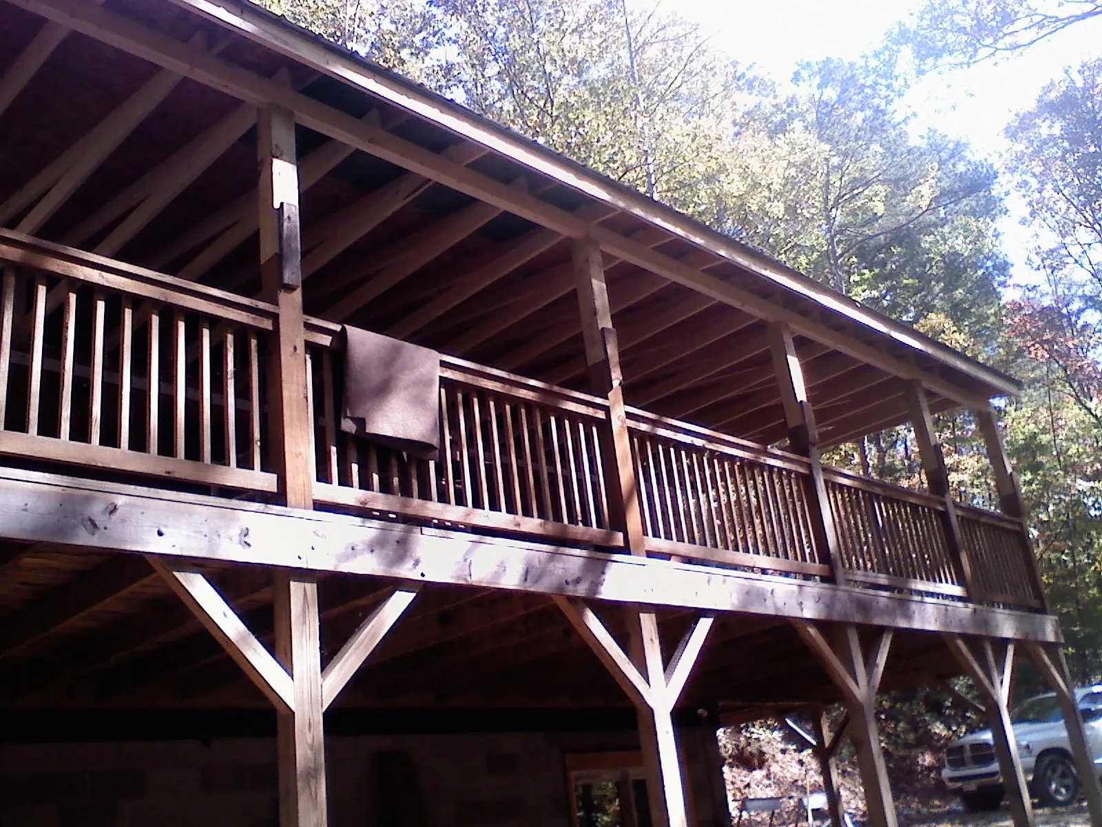 Timber framing under a new elevated porch and deck — Roof Leak Repair in Porter Corners by Roofing Brothers